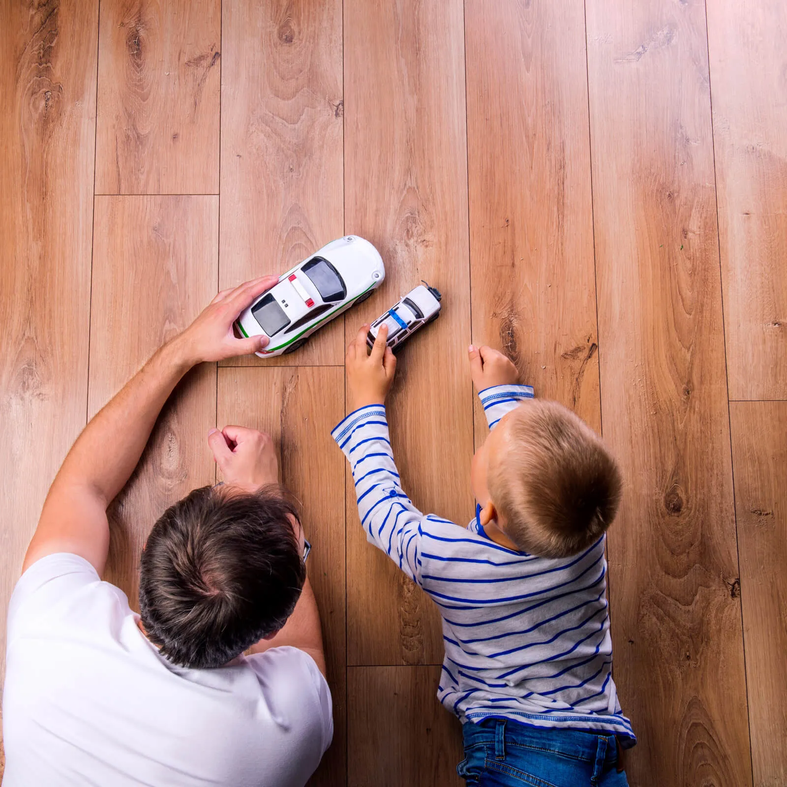 Dad & son Playing with toys | Staff Carpet
